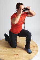 ANGELINA KNEELING POSE WITH SPYGLASS